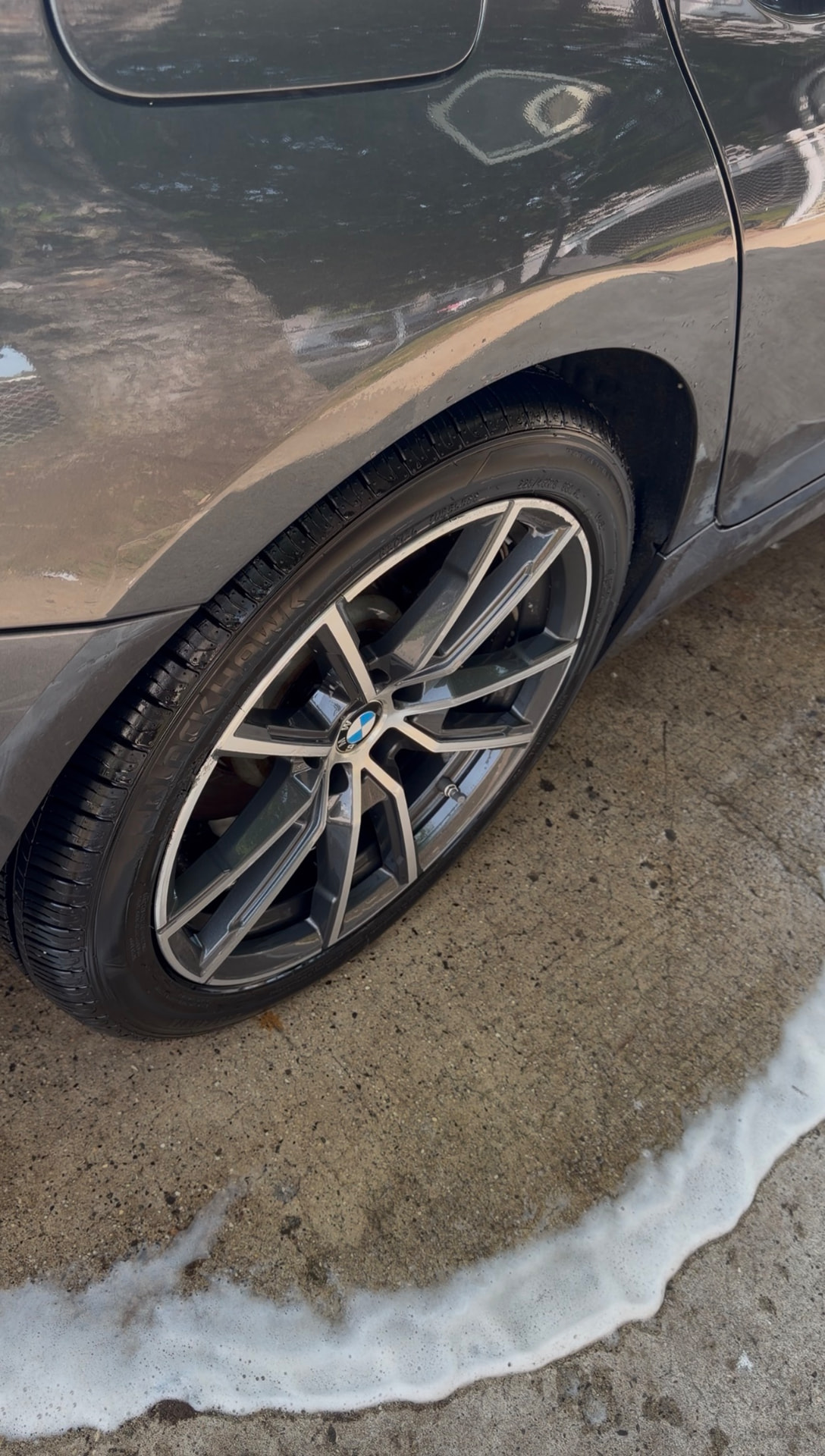 BMW alloy wheel and glossy paint after wash by Shine Society NJ